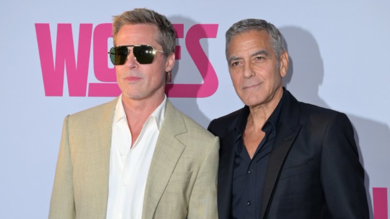 George Clooney mit Brad Pitt auf der Filmpremiere von Wolf.